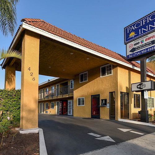 A two-story motel, marked 